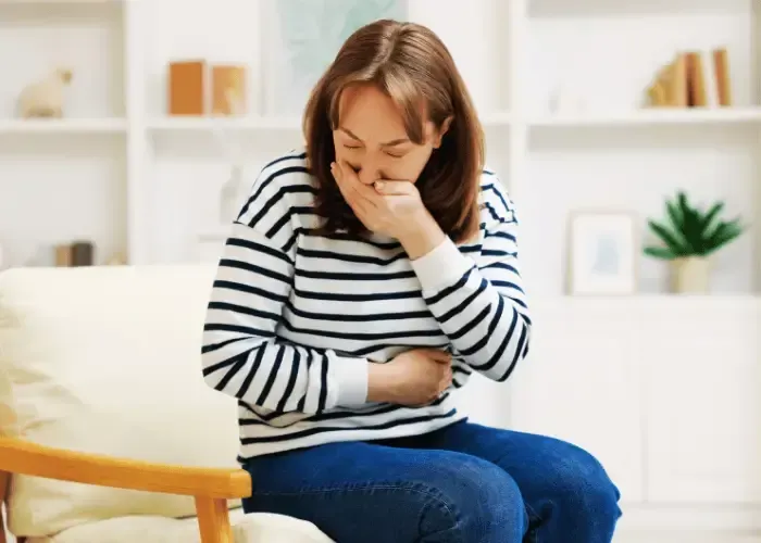 Nauseous woman due to unnatural weight loss diet in Gainesville Georgia.