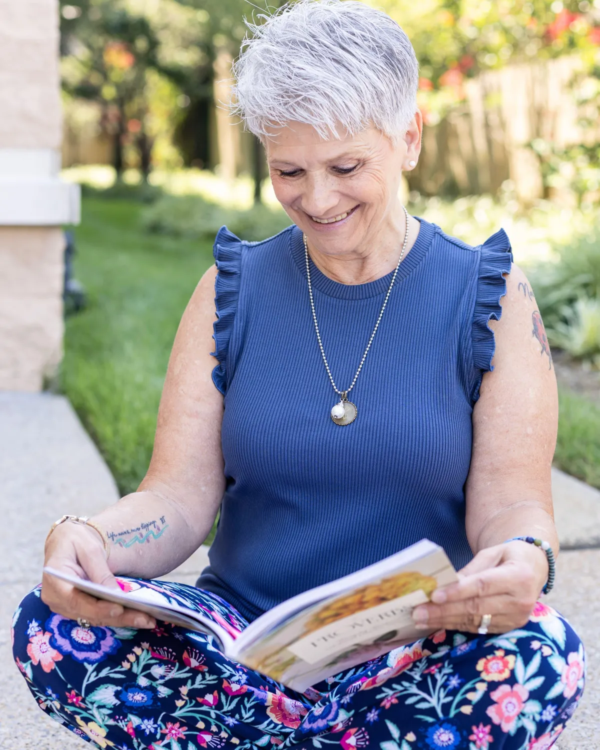 Vickie Turley sitting with book