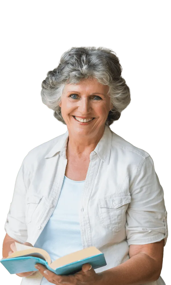 Smiling mature woman holding self-published book