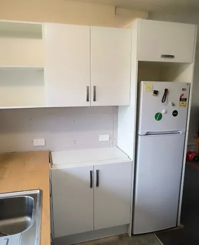 Custom kitchen joinery with fitted fridge and cabinets in Wellington