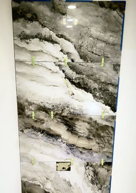 Stone-look feature wall tiling installed in Wellington home