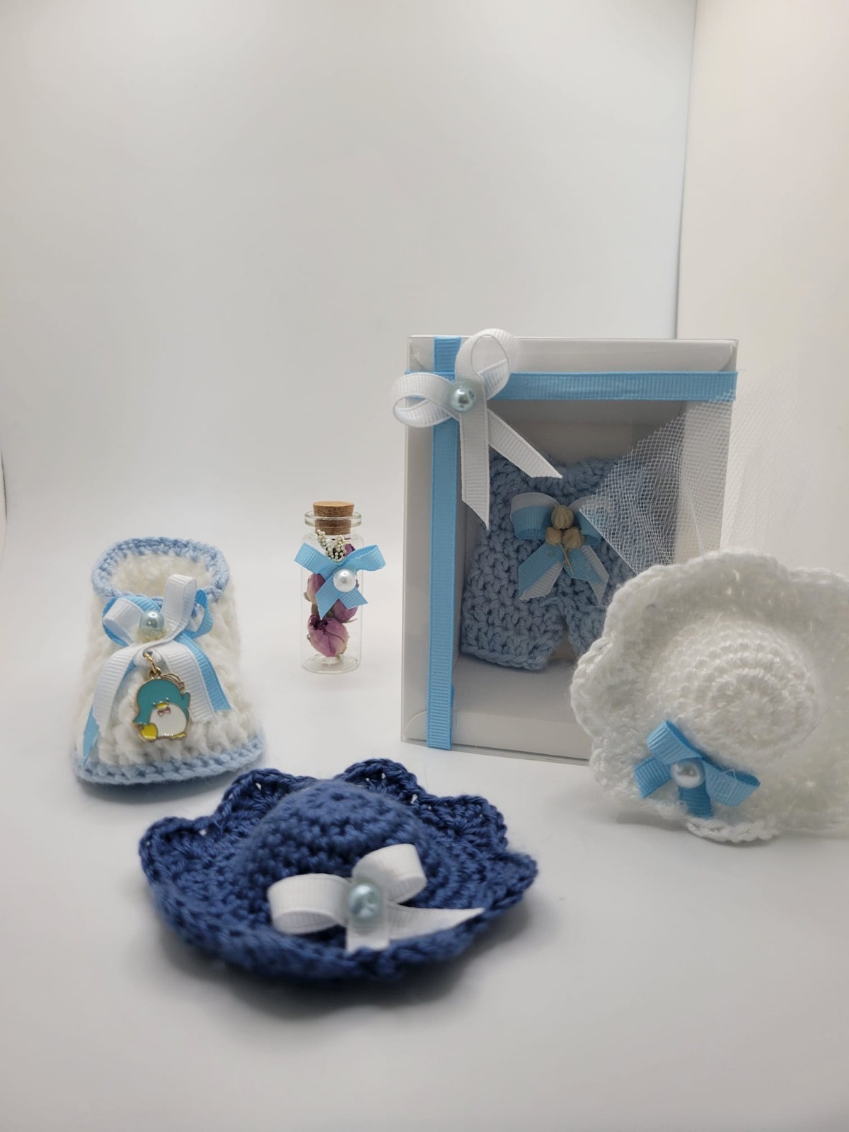 a group of balls of yarn sitting on top of a wooden floor