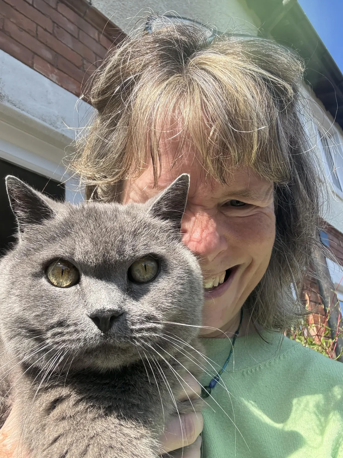 Photo of Hilary Dancing, Holistic therapist and coach with her cat, Merlin