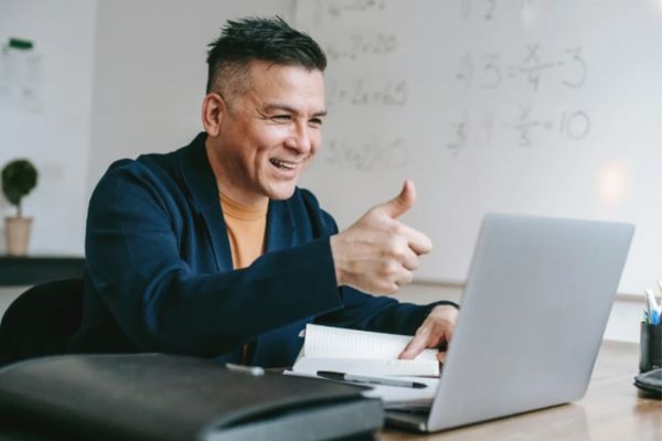 Professional attending a remote online notarization session on a laptop in Miami Florida