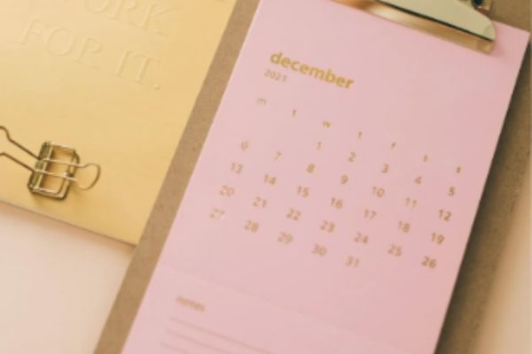 December planning calendar with important documents for year-end notarization and legal preparation