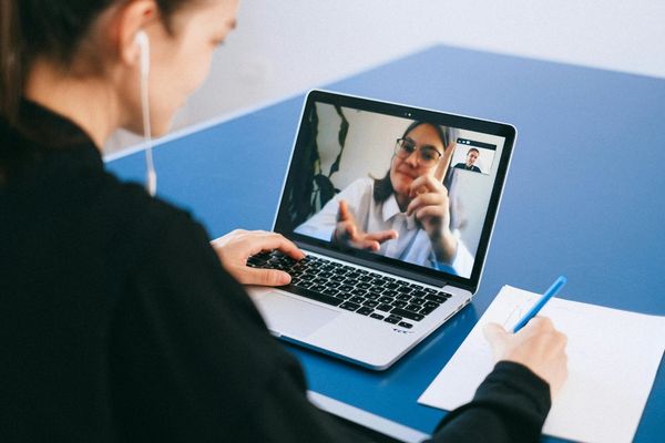 Remote online notarization session on laptop during holiday travel and year-end document signing