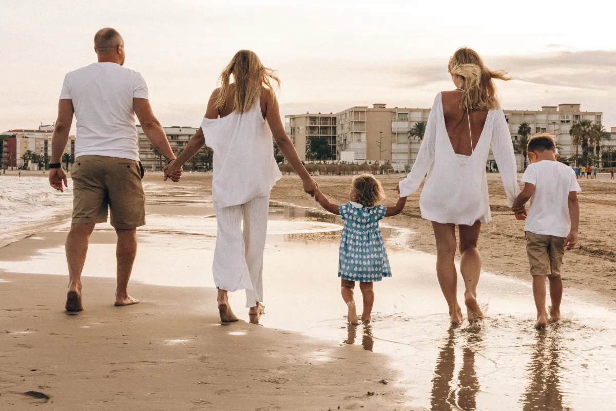family on a beach while on vacation