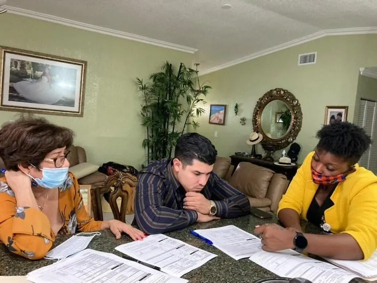 Professional notarial signing with a smile