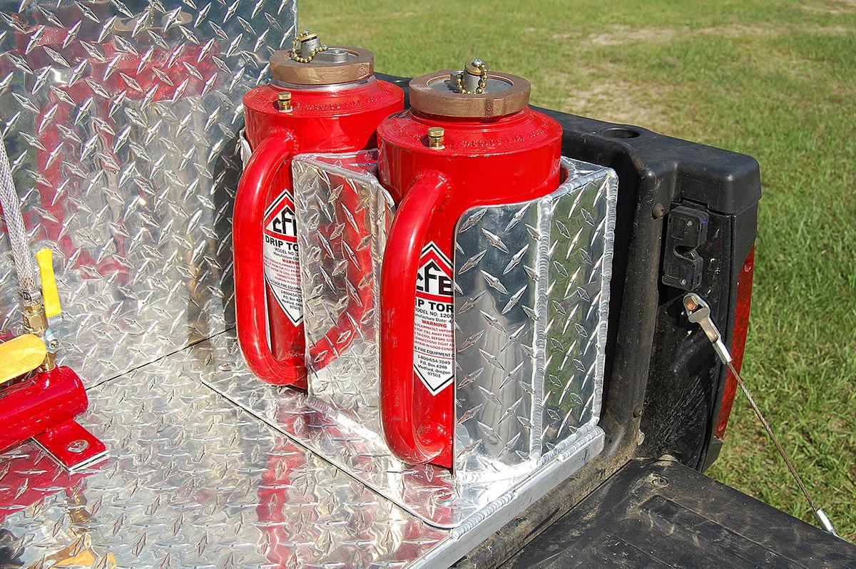 Southern Rough two-torch drip torch holder with fully boxed 12 gauge aluminum diamond plate construction mounted on UTV wildland fire unit