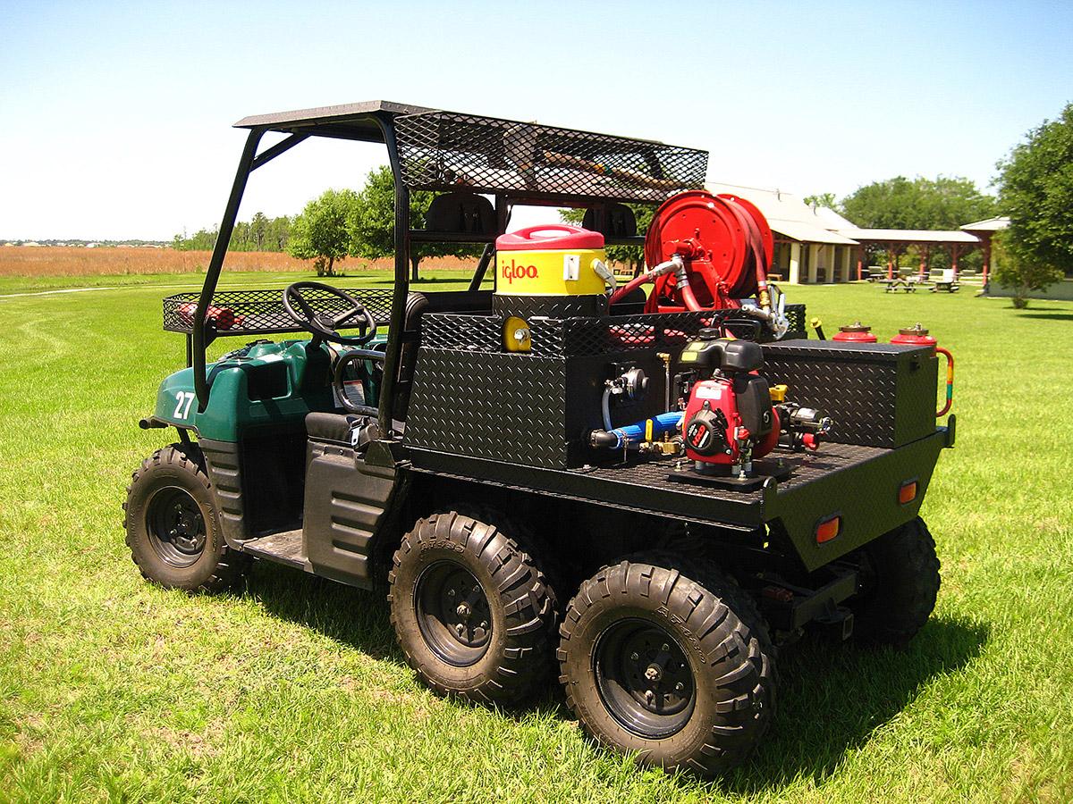 Southern Rough flatbed replacement UTV fire unit maximizing space and storage with diamond plate construction, forestry hose reel, and portable pump