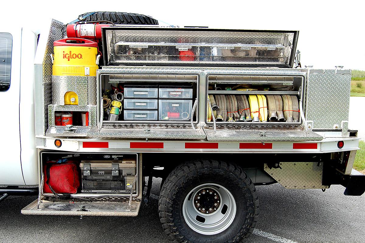Southern Rough wildland fire engine side view showing endless custom storage options including labeled compartments, hose storage, drawer organizers, and underbody boxes