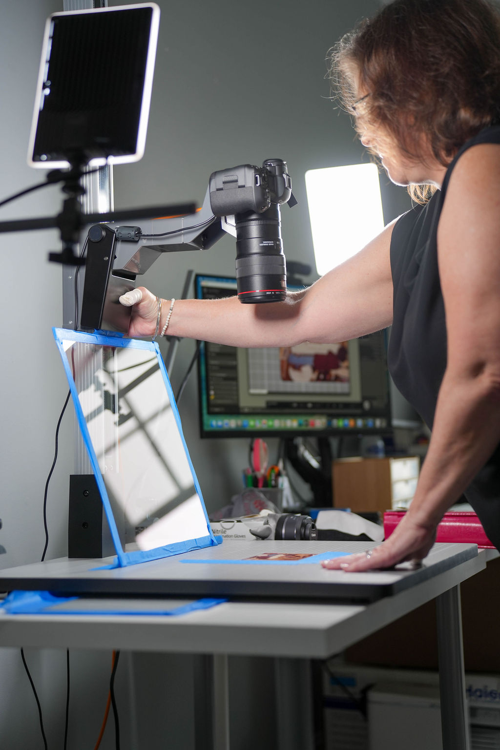 Magic Lantern Memories High-resolution Digital Camera Scanning for archival photo organization.