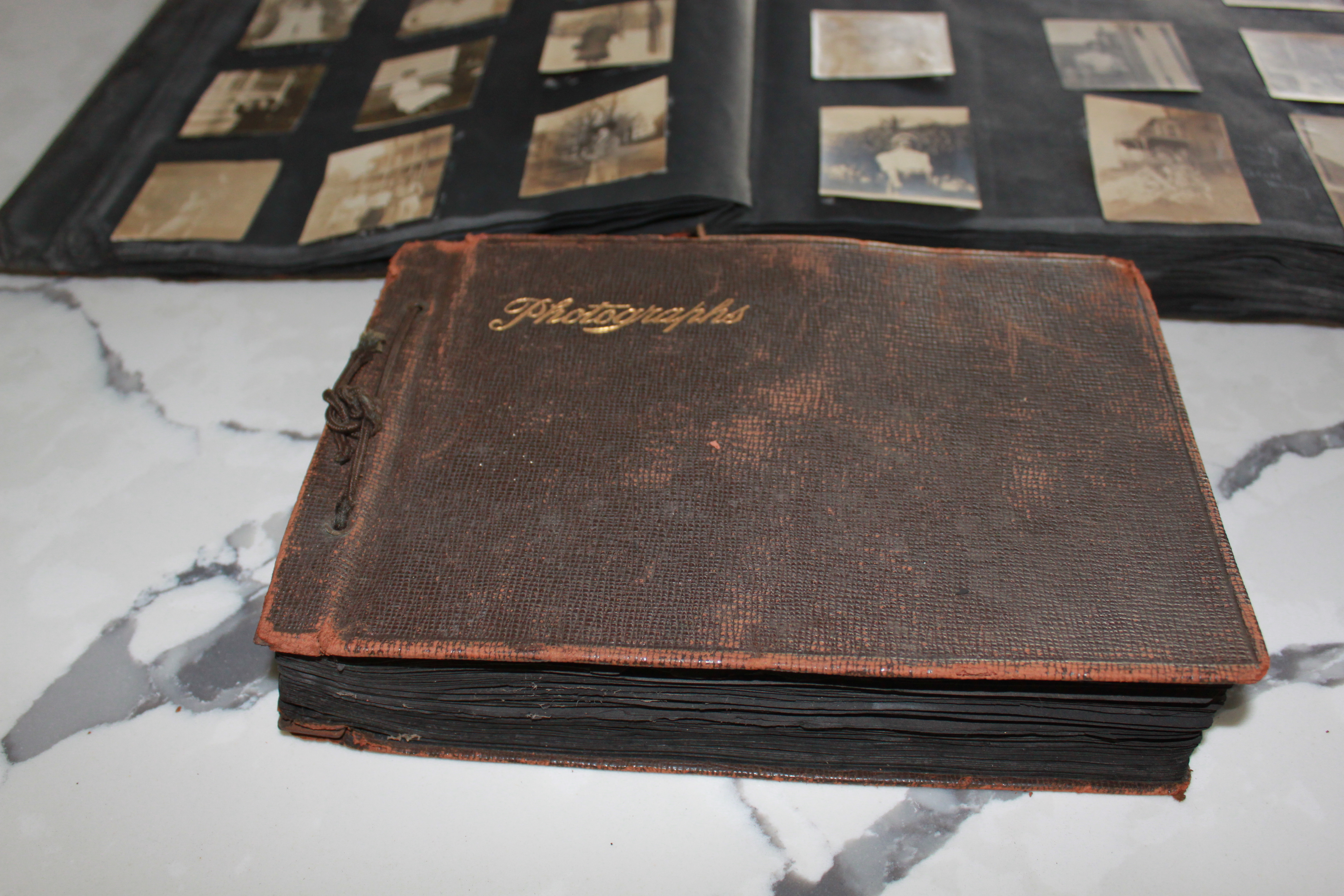 Magic Lantern Memories media conversion preserving vintage photo albums and family memories.