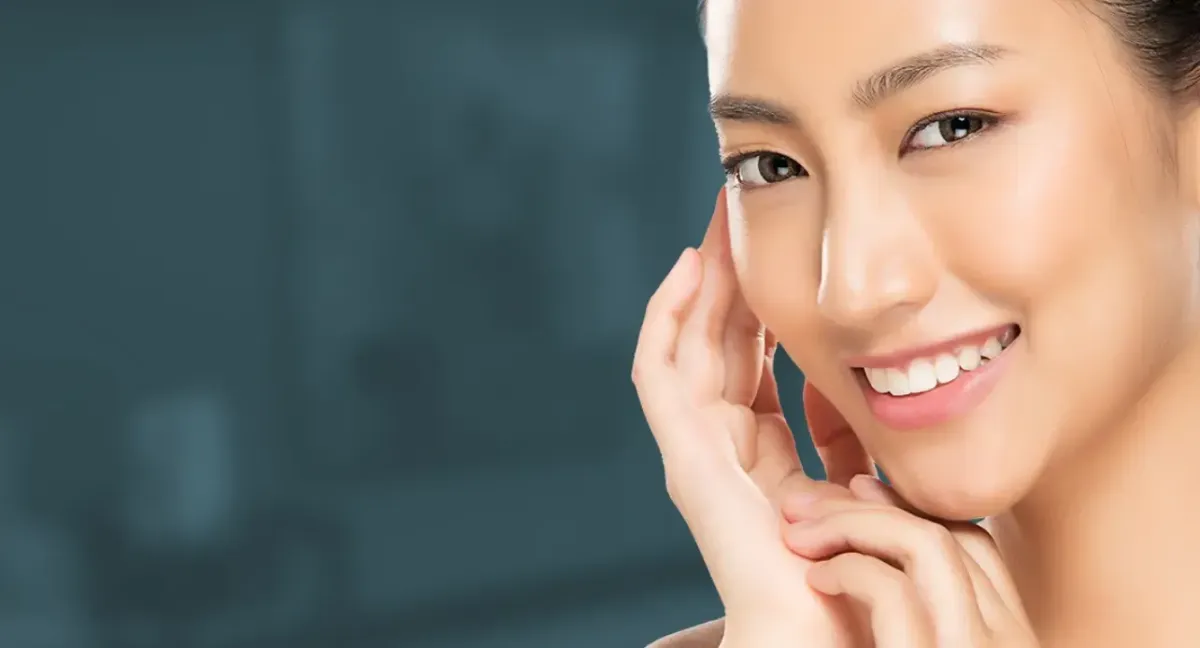 person in white dress shirt wearing green and white hat