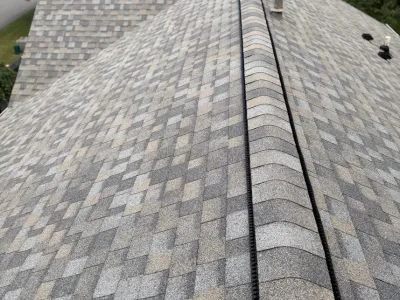 Asphalt shingle roof inspection showing storm damage - professional roofing services Sharon PA Pittsburgh Cleveland Youngstown
