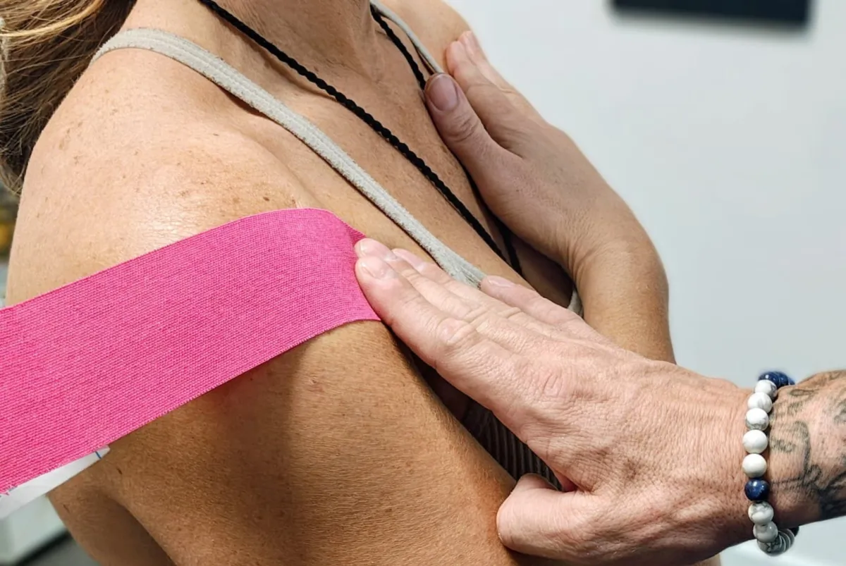 Kinesiology taping for shoulder support and pain relief in South Jordan Utah