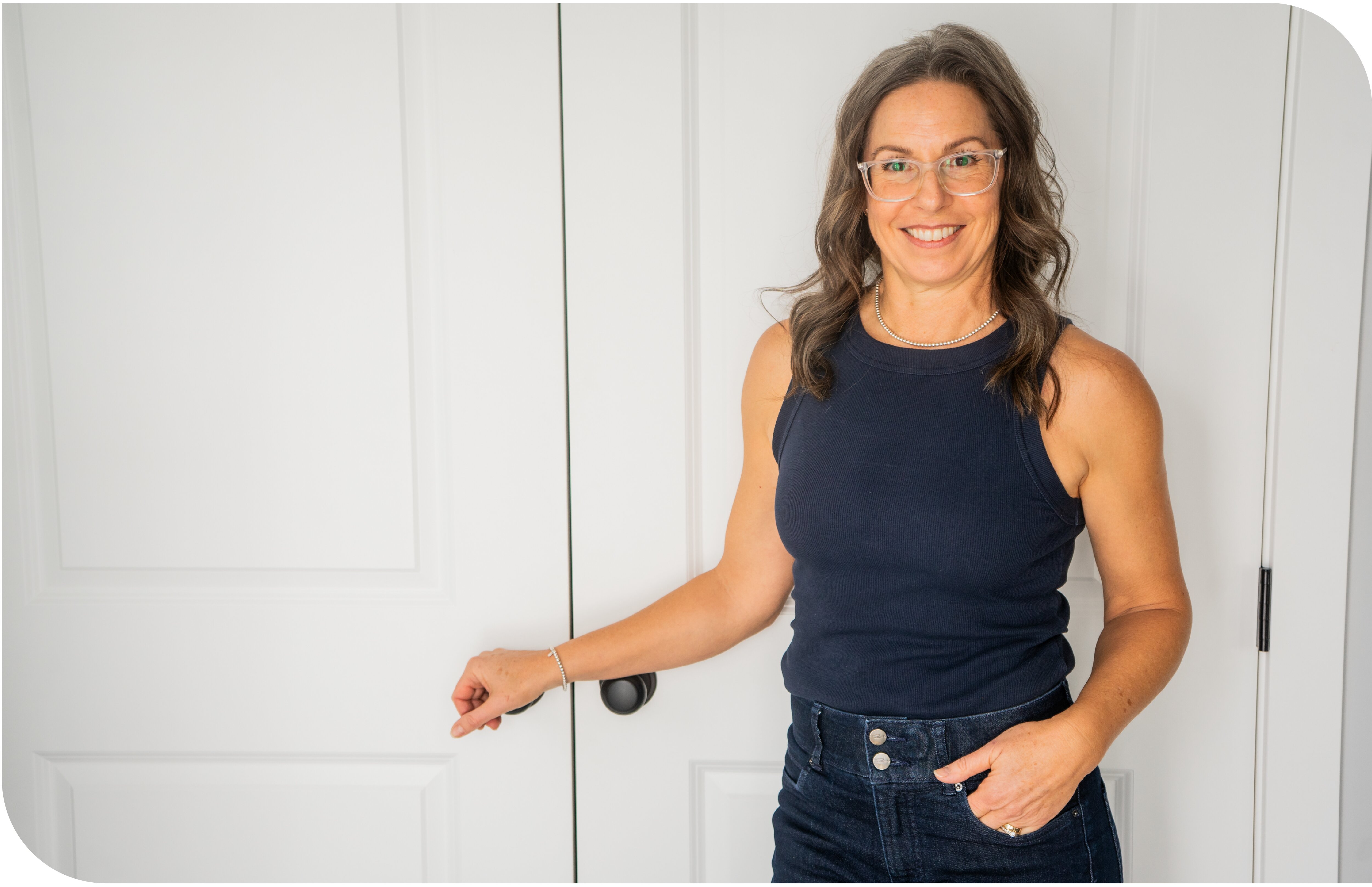 image of Paula in front of white doors