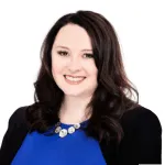 Dr Elizabeth Hoefer thumbnail picture headshot blue shirt black hair smiling