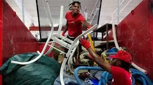 red and white bus on gray concrete road during daytime