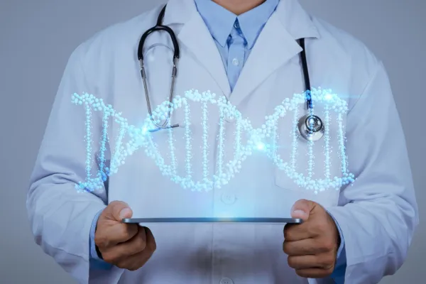 Laboratory technician using a pipette to transfer liquid into a test tube, surrounded by glassware and scientific equipment, emphasizing health optimization and lab testing services at Zel Vitality.