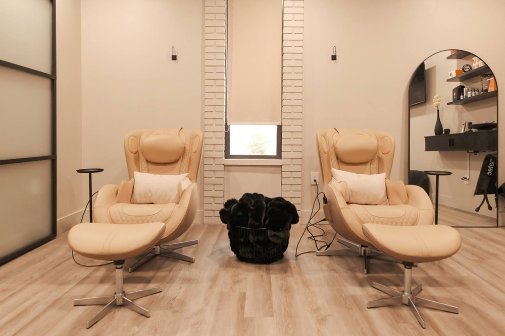 Healthcare professional preparing IV therapy for hydration and nutrient replenishment at Zēl Vitality wellness center.