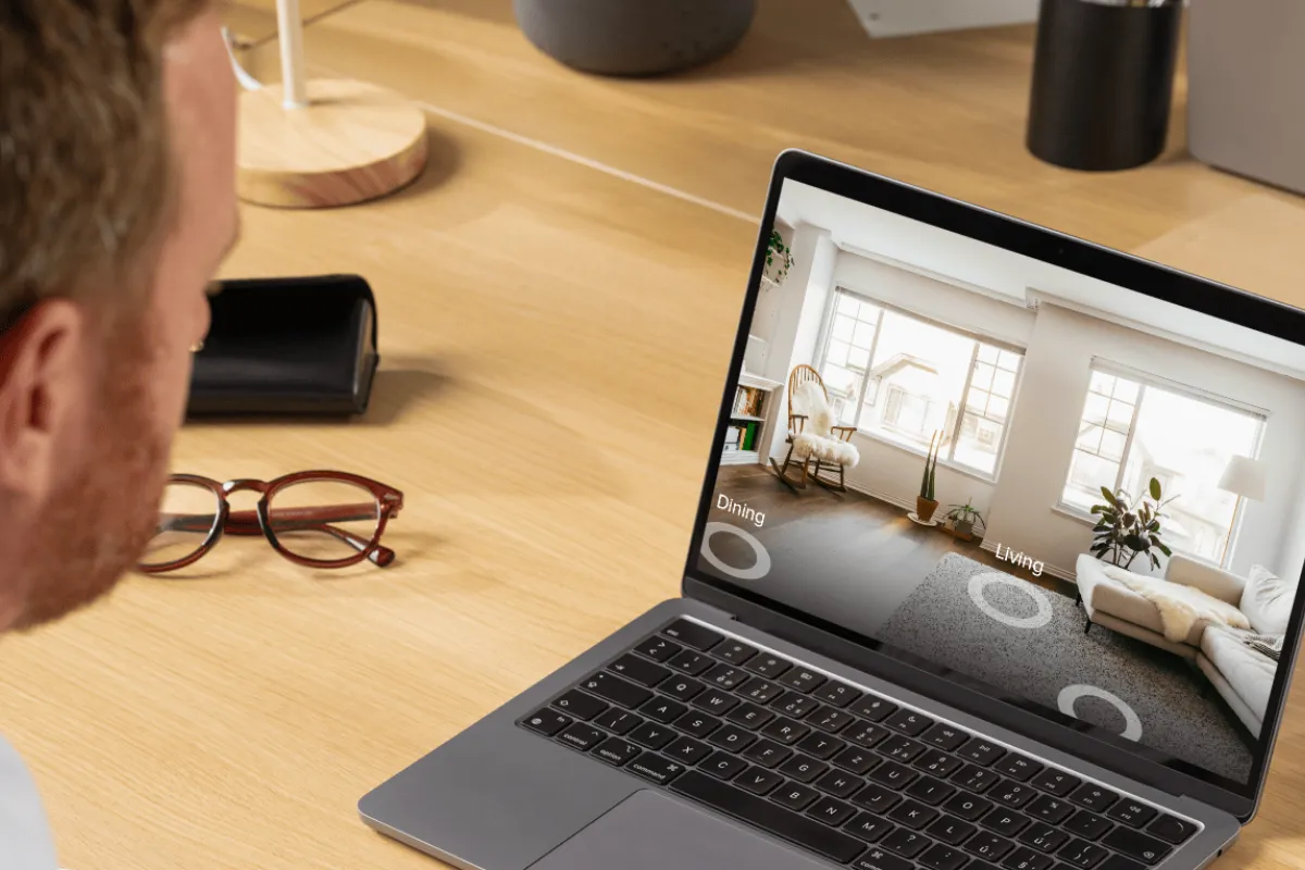 A homebuyer surfing zillow and using a 3D tour feature