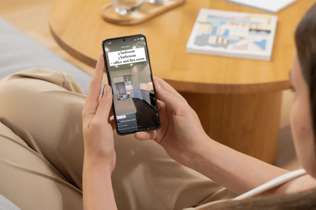 a woman surfing instagram watching a home tour reel