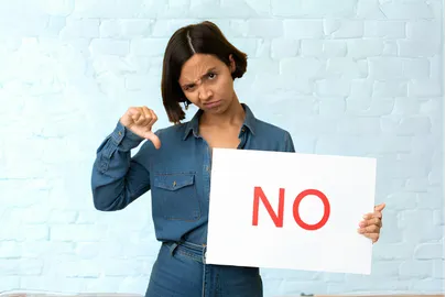 Symbolic image of a personchoosing no, representing public trust and democratic decision‑making.