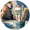 Hand-painted mugs at a DIY mug decorating event for social and artistic gatherings