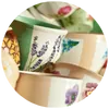 Crafting station with flower pots and paint for a creative community garden event
