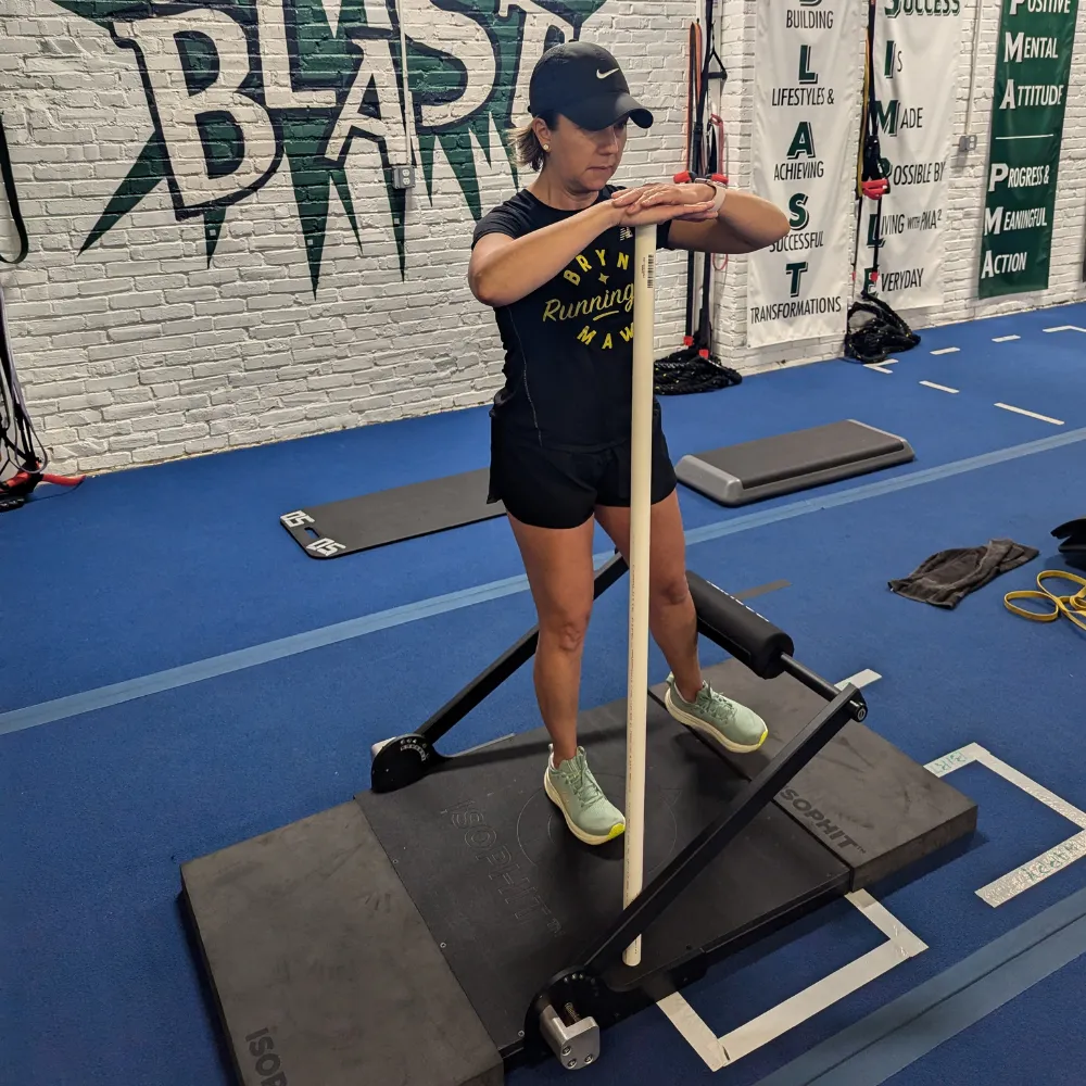 Client using IsoPhit Strength System during personal training at Ultimate Wellness in Havertown PA