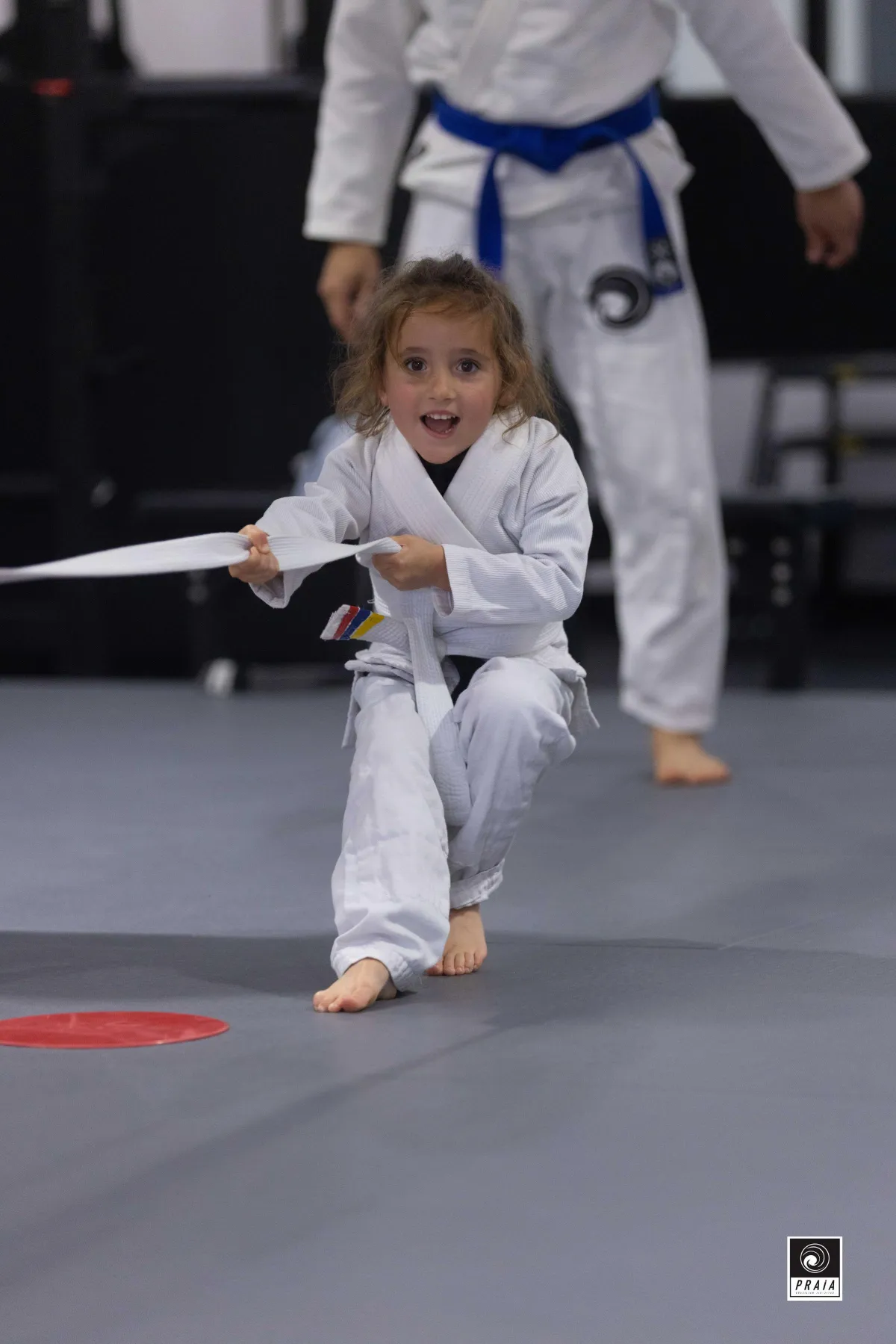 group of childrens sitting on ground