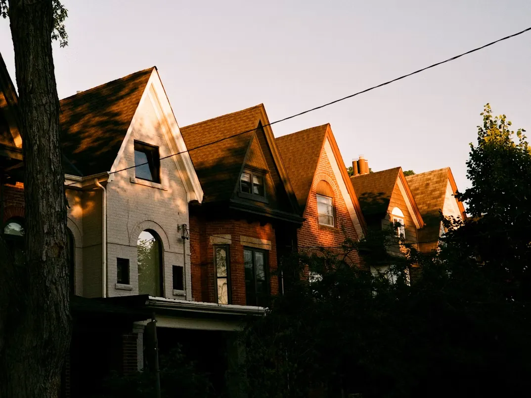 Victorian and Edwardian rowhouses in Leslieville, East Toronto — golden hour