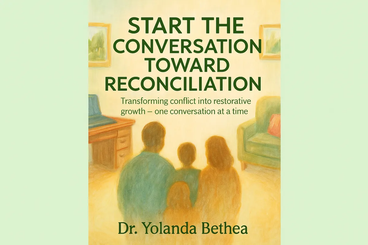 persons hand with white manicure