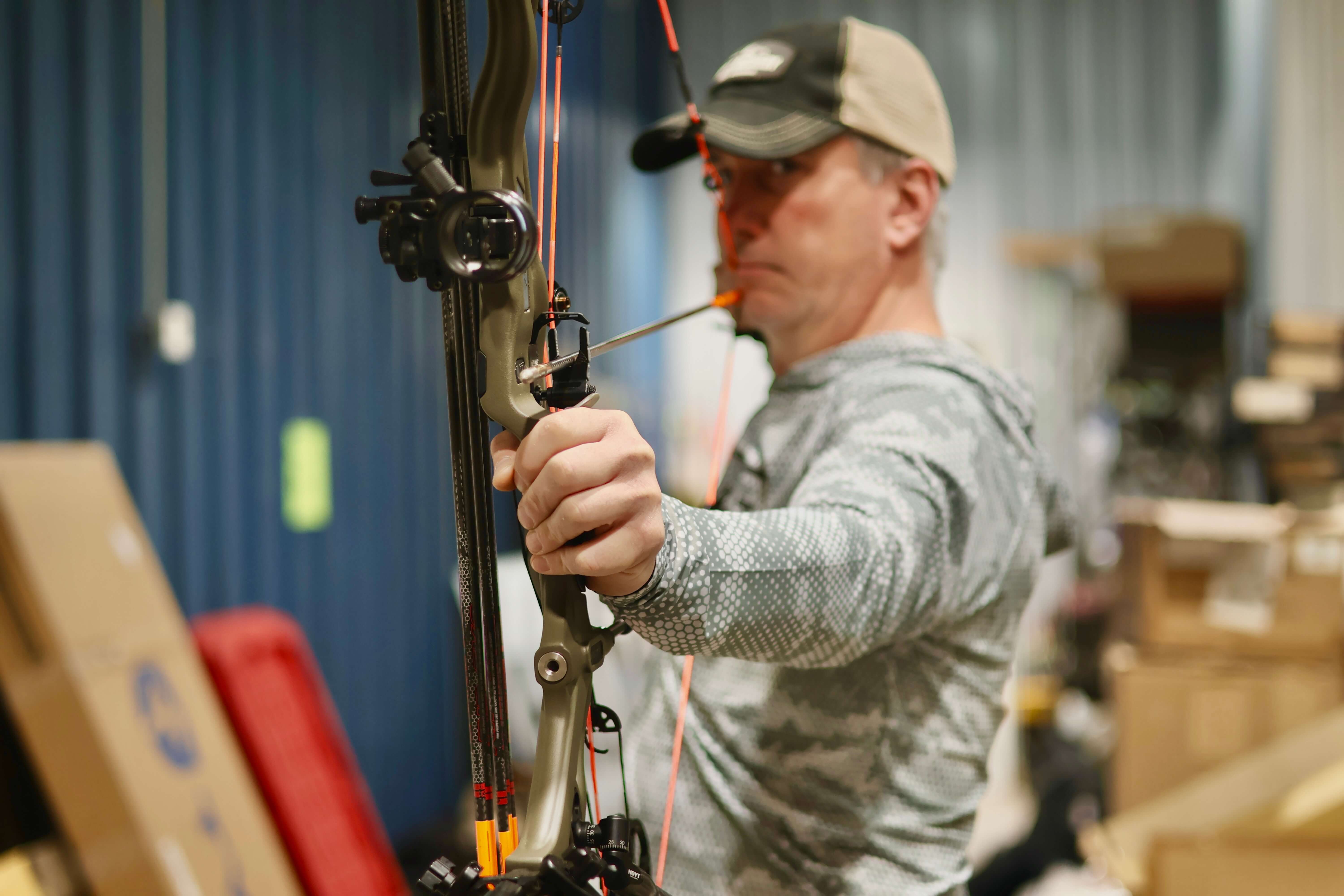 Archer at full draw