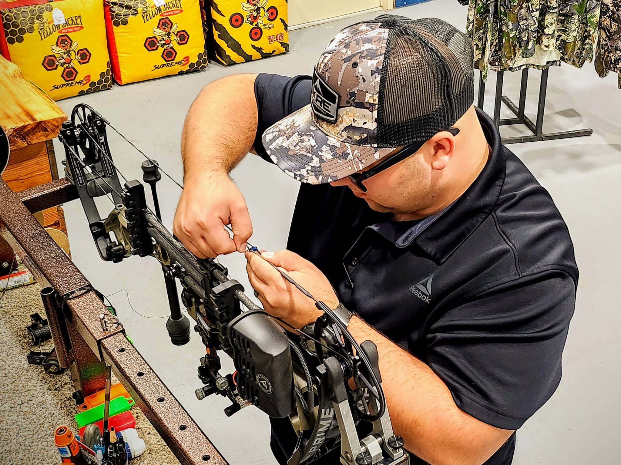 Bow string repair in store