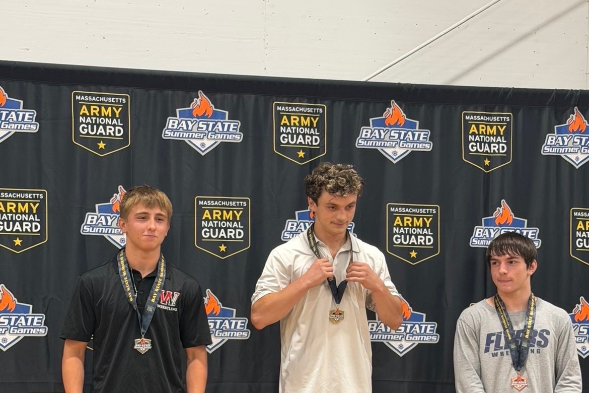 Leo Gannon on the podium with a silver medal at the 2026 Bay State Games