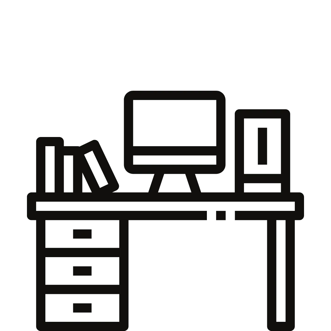 a white desk with a laptop on top of it