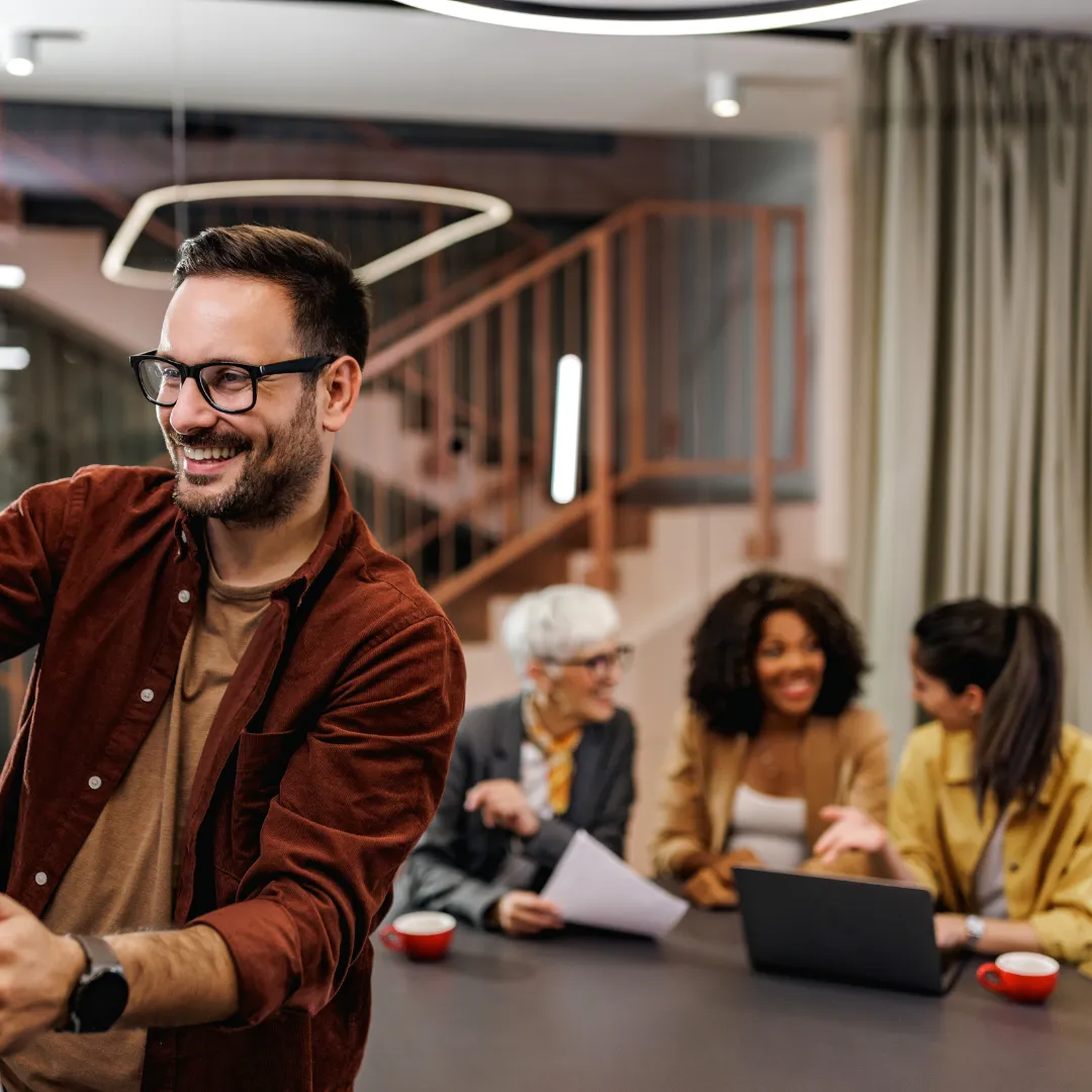 man holding incandescent bulb