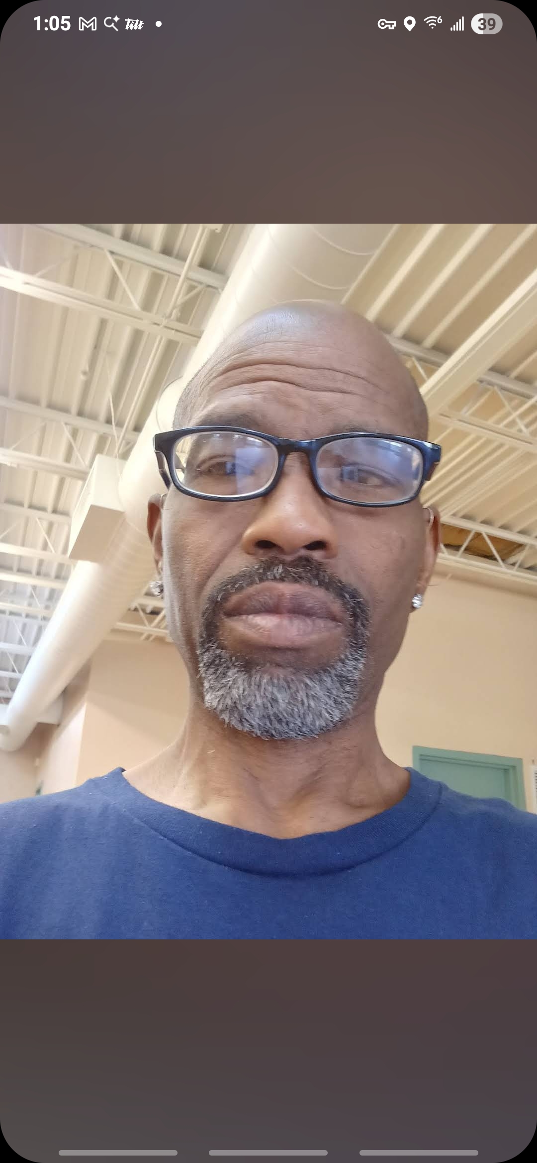 Man showing off fresh beard trim