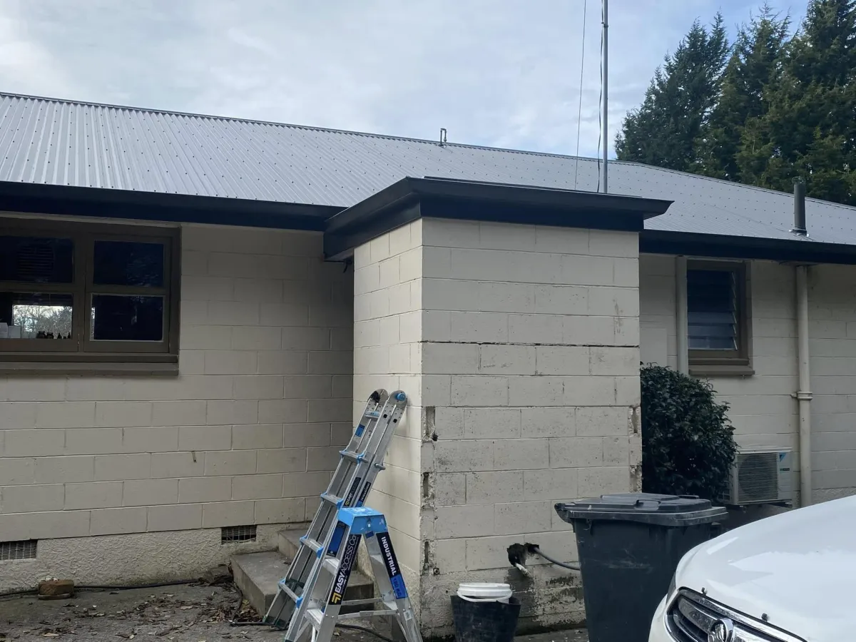 Gutter cleaning service image showing thorough debris removal and preventive care by HM Roofing & Maintenance in Ashburton.