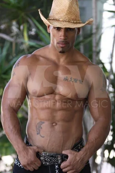 Black male stripper Genuine with a straw cowboy hat, showcasing his fitness