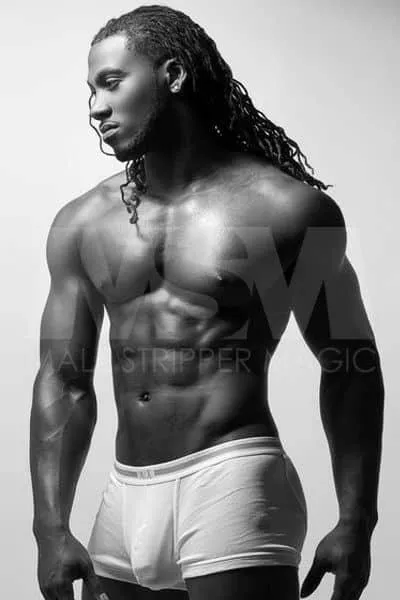 Black male stripper Showtime in black and white photo with white boxer briefs