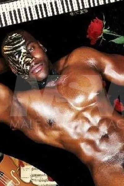 Black male stripper Onyx with a Phantom of the Opera mask