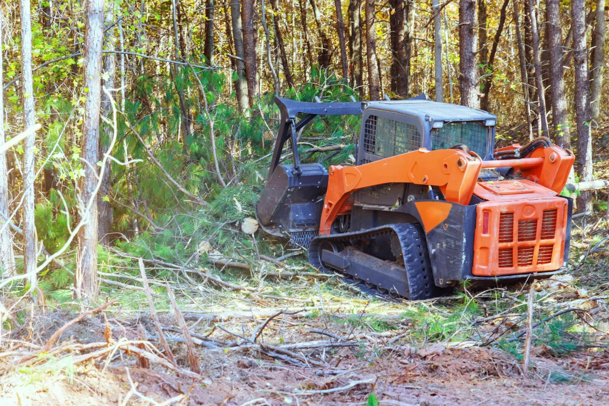 orange bulldozer clearing land