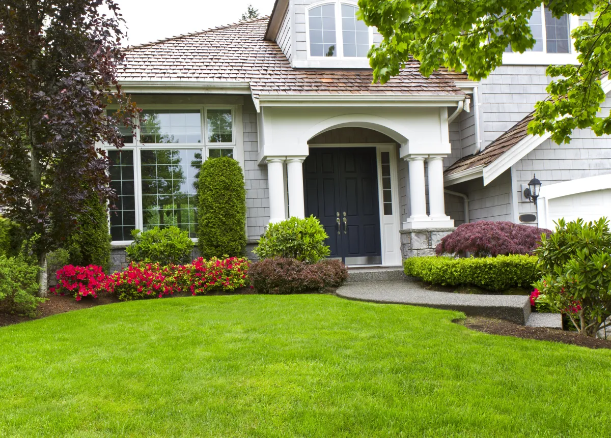 front view of a nice house with a cleaned up front lawn