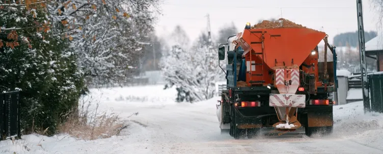loading truck with salt spreader, effectively removing ice with salt