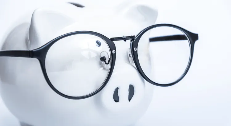 Savings jar symbolizing home affordability and money set aside for a home purchase.