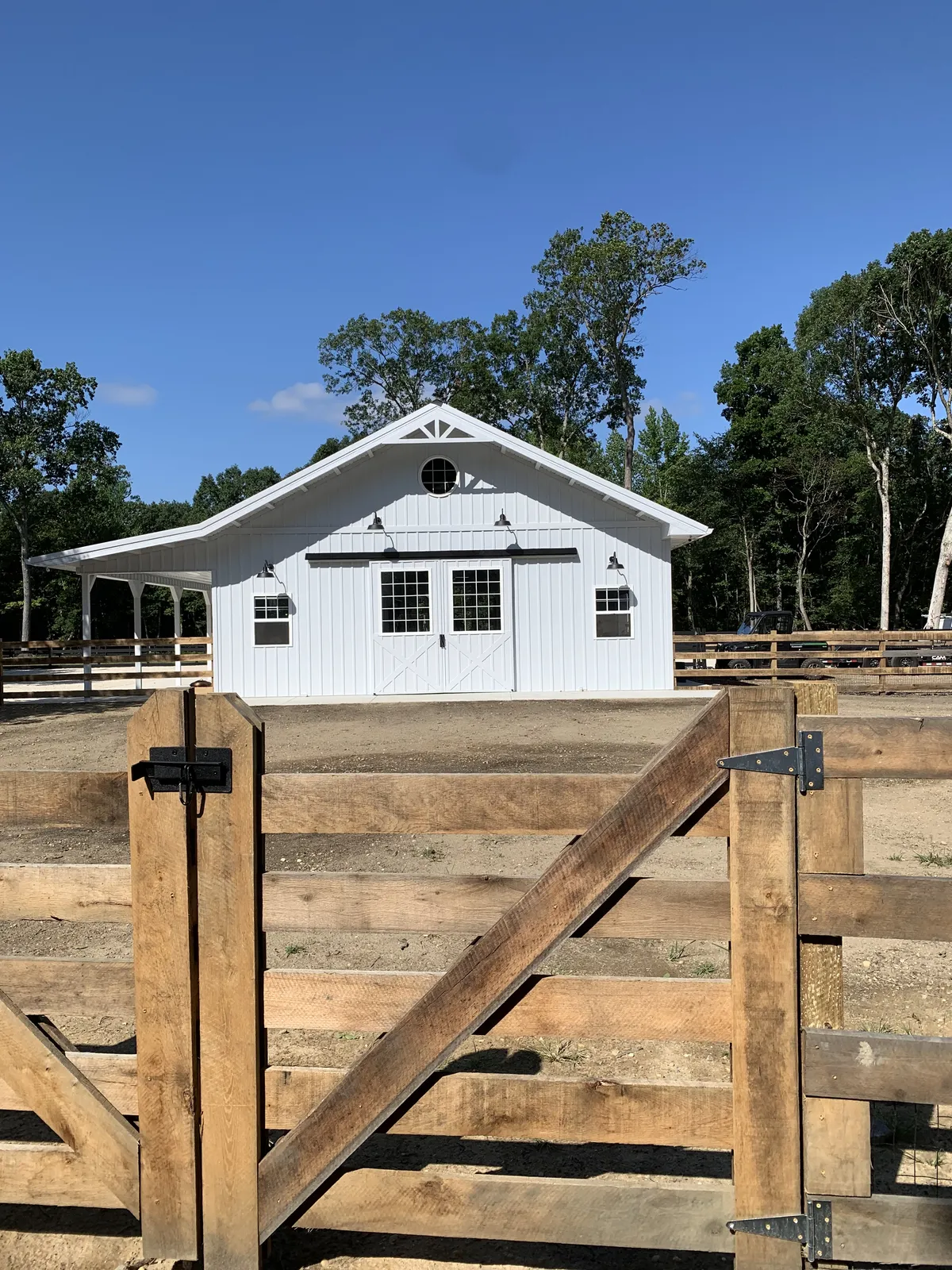 Horse barn exterior with covered access