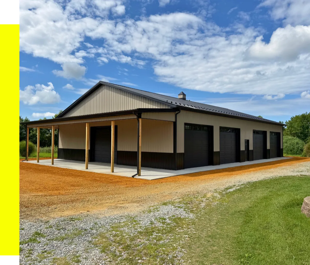 Tan multi-bay pole building with a covered porch